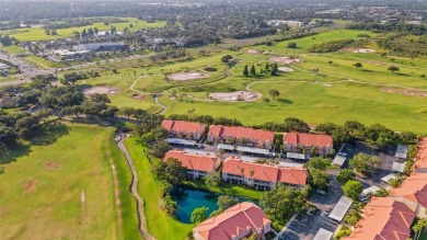 Maintenance-Free Luxury Living with Waterfall Views in on Grasslands Golf and Country Club in Florida - for sale on GolfHomes.com, golf home, golf lot