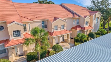 Maintenance-Free Luxury Living with Waterfall Views in on Grasslands Golf and Country Club in Florida - for sale on GolfHomes.com, golf home, golf lot