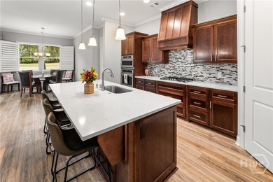 Experience the height of *easy living* in this stunning on The Landings Club - Palmetto in Georgia - for sale on GolfHomes.com, golf home, golf lot