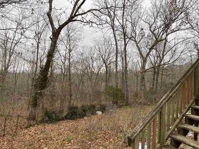 Tucked away on a quiet cul-de-sac in the heart of Cherokee on Cherokee Village South Course in Arkansas - for sale on GolfHomes.com, golf home, golf lot