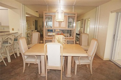 Impressive second floor light and bright END UNIT offers views on Saint Andrews South Golf Club in Florida - for sale on GolfHomes.com, golf home, golf lot