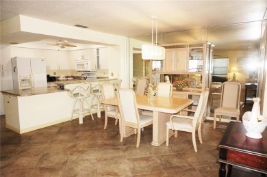 Impressive second floor light and bright END UNIT offers views on Saint Andrews South Golf Club in Florida - for sale on GolfHomes.com, golf home, golf lot