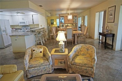 Impressive second floor light and bright END UNIT offers views on Saint Andrews South Golf Club in Florida - for sale on GolfHomes.com, golf home, golf lot