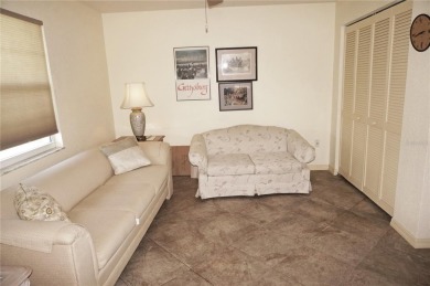 Impressive second floor light and bright END UNIT offers views on Saint Andrews South Golf Club in Florida - for sale on GolfHomes.com, golf home, golf lot