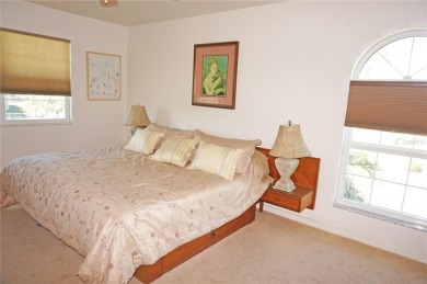 Impressive second floor light and bright END UNIT offers views on Saint Andrews South Golf Club in Florida - for sale on GolfHomes.com, golf home, golf lot