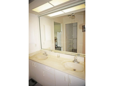 Impressive second floor light and bright END UNIT offers views on Saint Andrews South Golf Club in Florida - for sale on GolfHomes.com, golf home, golf lot