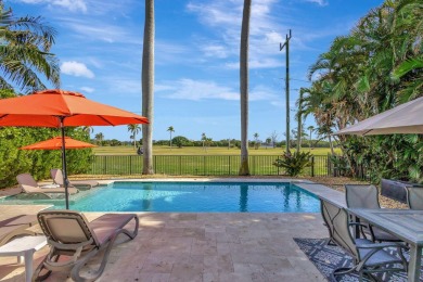 This luxurious 3 bedroom/2 bath home sits directly on famed Lake on Lake Worth Municipal Golf Course in Florida - for sale on GolfHomes.com, golf home, golf lot