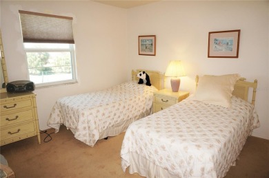 Impressive second floor light and bright END UNIT offers views on Saint Andrews South Golf Club in Florida - for sale on GolfHomes.com, golf home, golf lot