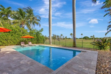 This luxurious 3 bedroom/2 bath home sits directly on famed Lake on Lake Worth Municipal Golf Course in Florida - for sale on GolfHomes.com, golf home, golf lot