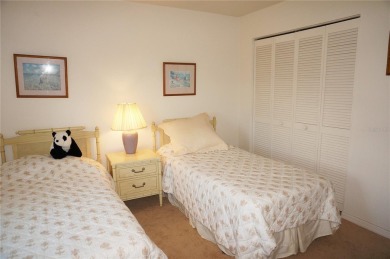 Impressive second floor light and bright END UNIT offers views on Saint Andrews South Golf Club in Florida - for sale on GolfHomes.com, golf home, golf lot
