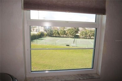 Impressive second floor light and bright END UNIT offers views on Saint Andrews South Golf Club in Florida - for sale on GolfHomes.com, golf home, golf lot