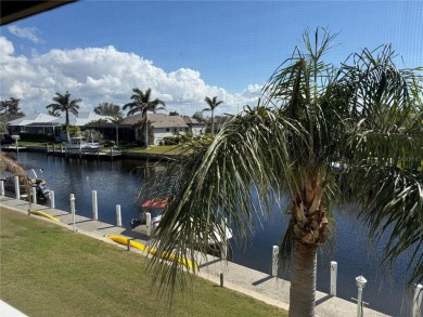 Impressive second floor light and bright END UNIT offers views on Saint Andrews South Golf Club in Florida - for sale on GolfHomes.com, golf home, golf lot