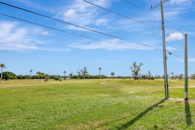 This luxurious 3 bedroom/2 bath home sits directly on famed Lake on Lake Worth Municipal Golf Course in Florida - for sale on GolfHomes.com, golf home, golf lot