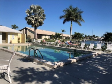 Impressive second floor light and bright END UNIT offers views on Saint Andrews South Golf Club in Florida - for sale on GolfHomes.com, golf home, golf lot