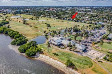 This luxurious 3 bedroom/2 bath home sits directly on famed Lake on Lake Worth Municipal Golf Course in Florida - for sale on GolfHomes.com, golf home, golf lot