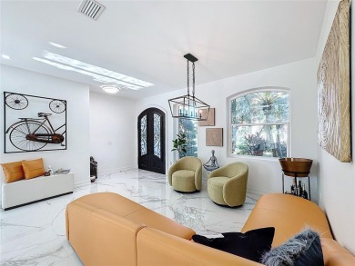 This beautiful, fully remodeled home features an open floor plan on Summerfield Crossing Golf Club in Florida - for sale on GolfHomes.com, golf home, golf lot