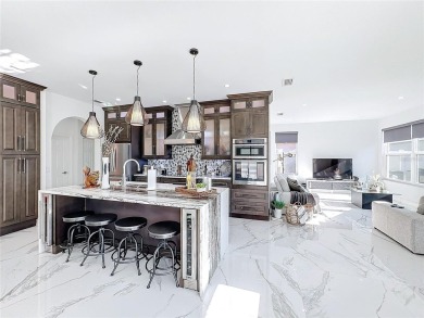 This beautiful, fully remodeled home features an open floor plan on Summerfield Crossing Golf Club in Florida - for sale on GolfHomes.com, golf home, golf lot