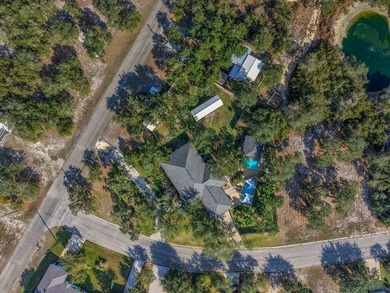 Tucked beneath a canopy of majestic coastal live oaks in the on Lamar Golf Course in Texas - for sale on GolfHomes.com, golf home, golf lot