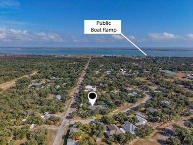 Tucked beneath a canopy of majestic coastal live oaks in the on Lamar Golf Course in Texas - for sale on GolfHomes.com, golf home, golf lot