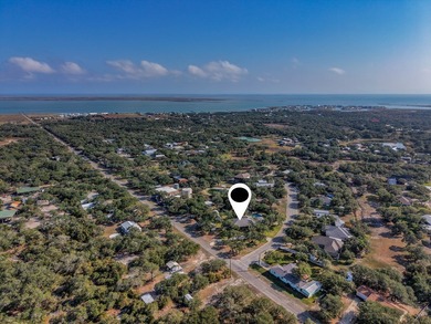Tucked beneath a canopy of majestic coastal live oaks in the on Lamar Golf Course in Texas - for sale on GolfHomes.com, golf home, golf lot