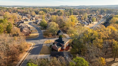 Beautiful, stately two-story home backing to the Country Club of on The Country Club of Arkansas in Arkansas - for sale on GolfHomes.com, golf home, golf lot