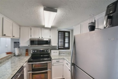 Welcome Home to this Charming 2-Bedroom, 2-Bathroom Condo in the on Mount Dora Golf Club in Florida - for sale on GolfHomes.com, golf home, golf lot