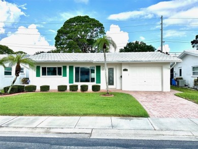 WOW!! Amazing home situated in the Mainlands.  A 55+ community on Mainlands Golf Club in Florida - for sale on GolfHomes.com, golf home, golf lot