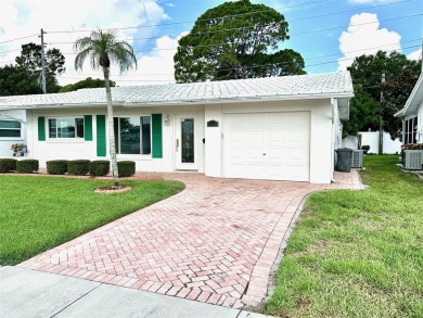 WOW!! Amazing home situated in the Mainlands.  A 55+ community on Mainlands Golf Club in Florida - for sale on GolfHomes.com, golf home, golf lot