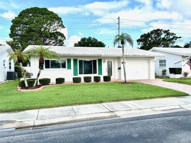 WOW!! Amazing home situated in the Mainlands.  A 55+ community on Mainlands Golf Club in Florida - for sale on GolfHomes.com, golf home, golf lot