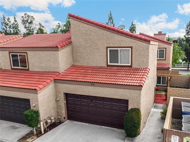 Welcome to this beautifully updated Mark III townhome, ideally on Fullerton Golf Course in California - for sale on GolfHomes.com, golf home, golf lot