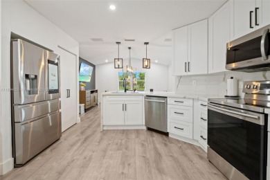 This beautiful 3 bedrooms, 2 1/2 bathrooms, 2-car garage on Grand Palms Hotel and Golf Resort in Florida - for sale on GolfHomes.com, golf home, golf lot