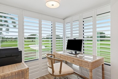 Beautifully reimagined 2-bedroom, 2-bath residence set on the on Quail Ridge Golf Course and Country Club in Florida - for sale on GolfHomes.com, golf home, golf lot