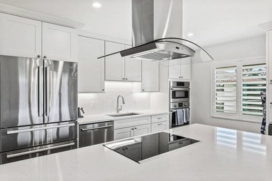 Beautifully reimagined 2-bedroom, 2-bath residence set on the on Quail Ridge Golf Course and Country Club in Florida - for sale on GolfHomes.com, golf home, golf lot