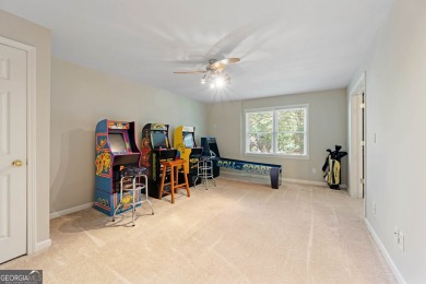 Welcome to this stunning 7-bedroom home located in the very on Woodmont Golf and Country Club in Georgia - for sale on GolfHomes.com, golf home, golf lot