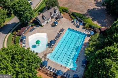Welcome to this stunning 7-bedroom home located in the very on Woodmont Golf and Country Club in Georgia - for sale on GolfHomes.com, golf home, golf lot