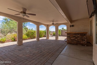 Nestled on a tranquil cul-de-sac along the 2nd fairway of Coyote on Coyote Lakes Golf Club in Arizona - for sale on GolfHomes.com, golf home, golf lot
