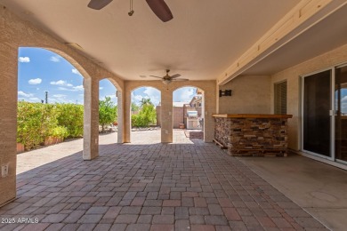 Nestled on a tranquil cul-de-sac along the 2nd fairway of Coyote on Coyote Lakes Golf Club in Arizona - for sale on GolfHomes.com, golf home, golf lot