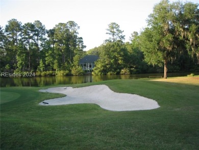 Mature magnolia and live oak trees are abundant on this .575 on Callawassie Island Club in South Carolina - for sale on GolfHomes.com, golf home, golf lot