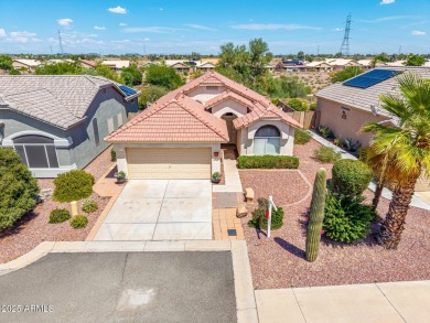 Nestled on a tranquil cul-de-sac along the 2nd fairway of Coyote on Coyote Lakes Golf Club in Arizona - for sale on GolfHomes.com, golf home, golf lot