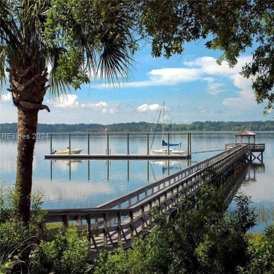 Mature magnolia and live oak trees are abundant on this .575 on Callawassie Island Club in South Carolina - for sale on GolfHomes.com, golf home, golf lot