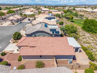 Nestled on a tranquil cul-de-sac along the 2nd fairway of Coyote on Coyote Lakes Golf Club in Arizona - for sale on GolfHomes.com, golf home, golf lot