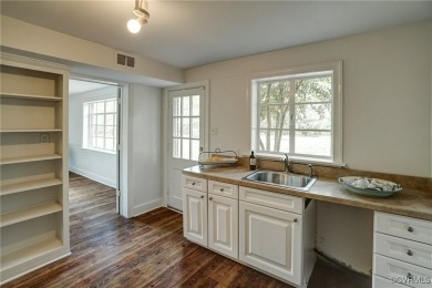 Located south of River Road  overlooking CCV's Tuckahoe Creek on Country Club of VA - James River in Virginia - for sale on GolfHomes.com, golf home, golf lot