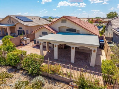 Nestled on a tranquil cul-de-sac along the 2nd fairway of Coyote on Coyote Lakes Golf Club in Arizona - for sale on GolfHomes.com, golf home, golf lot