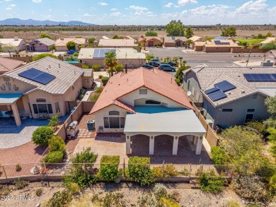 Nestled on a tranquil cul-de-sac along the 2nd fairway of Coyote on Coyote Lakes Golf Club in Arizona - for sale on GolfHomes.com, golf home, golf lot