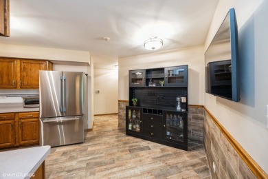 Effortless living awaits in the highly sought-after Villas of on Carriage Greens Country Club in Illinois - for sale on GolfHomes.com, golf home, golf lot