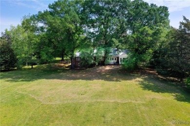 Located south of River Road  overlooking CCV's Tuckahoe Creek on Country Club of VA - James River in Virginia - for sale on GolfHomes.com, golf home, golf lot