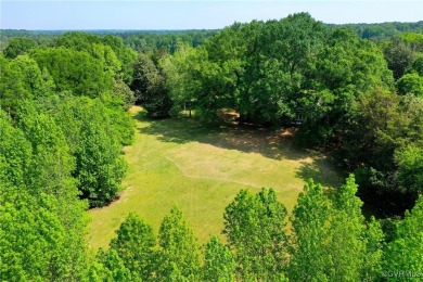 Located south of River Road  overlooking CCV's Tuckahoe Creek on Country Club of VA - James River in Virginia - for sale on GolfHomes.com, golf home, golf lot