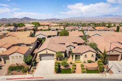 Step into refined living in this impeccably maintained Trenton on Revere Golf Club in Nevada - for sale on GolfHomes.com, golf home, golf lot