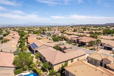Step into refined living in this impeccably maintained Trenton on Revere Golf Club in Nevada - for sale on GolfHomes.com, golf home, golf lot