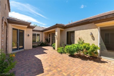 Step into refined living in this impeccably maintained Trenton on Revere Golf Club in Nevada - for sale on GolfHomes.com, golf home, golf lot